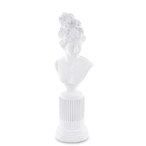 Postument Woman w kolorze białym, wysokość 36 cm. Figurka przedstawia delikatną głowę kobiety z ozdobnym upięciem włosów. Ustawiona na cylindrycznej podstawie z pionowymi żłobieniami. Całość ma matową fakturę, prezentuje klasyczny styl.