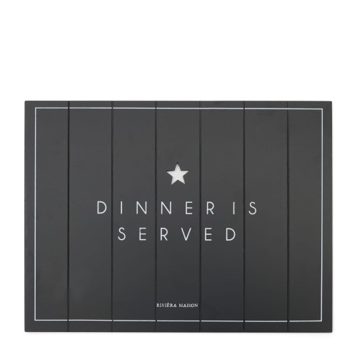 Czarna podkładka na stół z napisem DINNER IS SERVED, wyróżniająca się białą obramówką i dekoracyjną gwiazdką. Produkt leży poziomo, prezentując równomierne panele. Ozdobny detal z minimalistycznym wzorem nadaje elegancki wygląd.