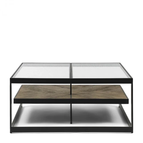Stolik kawowy Graydon Riviera Maison 90x90 cm z metalową, czarną ramą i dwoma półkami. Górny blat szklany, dolny z teksturowanego drewna. Widok frontalny, stojący. Idealny do nowoczesnych wnętrz, z prostym tłem dla lepszej widoczności.