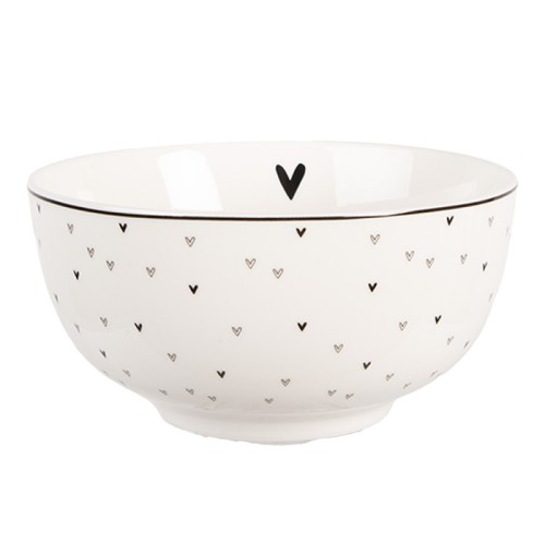 Porcelanowa miseczka o białym tle z drobnymi czarnymi serduszkami, lekko zaokrąglona, z widocznym czarnym sercem w środku. Produkt stojący, idealny do podawania przekąsek lub deserów. Brzeg miseczki zdobiony cienką czarną linią.