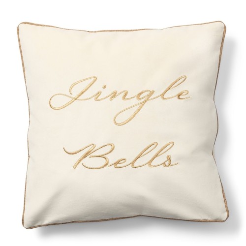 Poszewka w kolorze kremowym o wymiarach 50x50 cm z haftem Jingle Bells w złotym kolorze. Produkt ma prostokątny kształt, z delikatnym obszyciem w odcieniu złota. Idealna do dekoracji wnętrz.