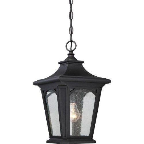 Czarna lampa wisząca zewnętrzna Begley o wymiarach 17,8x31,4 cm. Kształt latarni z przezroczystymi ściankami, zawieszona na łańcuszku. Wnętrze z oprawką na żarówkę, dekoracyjne detale w formie wycięć.