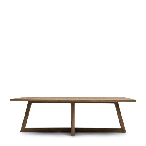 Stylowy stół Bali Bali o wymiarach 280x100 cm, wykonany z drewna w naturalnym odcieniu. Produkt prezentowany frontalnie, z prostokątnym blatem i charakterystycznymi, skośnymi nogami, zapewniającymi stabilność. Tło białe.