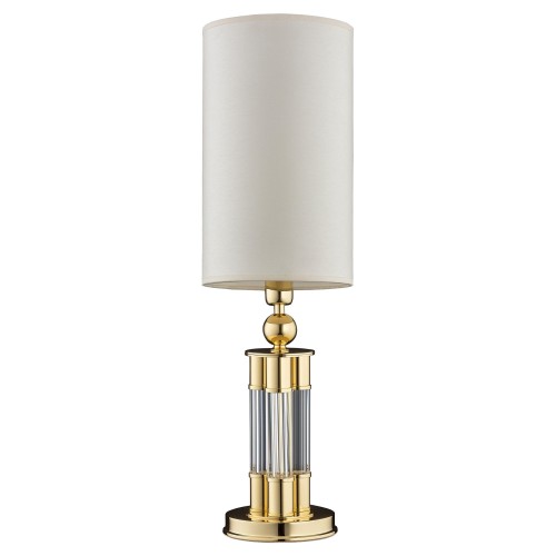 Lampa stołowa Lea o wysokości 60 cm, z okrągłą podstawą w kolorze złotym i przezroczystymi detalami. Górna część z białym abażurem w kształcie cylindra. Produkt stoi na płaskiej powierzchni, ujęty frontalnie.