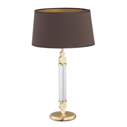 Lampa stołowa Tamara o wymiarach 32x32x57 cm, z brązowym abażurem i złotymi akcentami. Podstawa z przezroczystego materiału, zdobiona okrągłymi elementami. Prosta forma, elegancki design, na jednolitym tle.