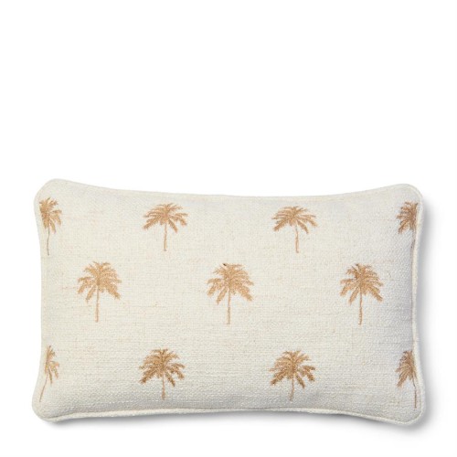 Poduszka Palm Groove 50x30 cm w kolorze kremowym z haftowanym wzorem palm w odcieniach złota. Ułożona poziomo, z lekko zaokrąglonymi brzegami, idealna do dekoracji wnętrz. Tło białe, co podkreśla detale haftu.