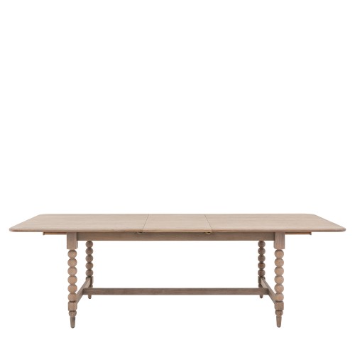 Dębowy prostokątny stół do jadalni Artisan, rozkładany, z gładkim blatem i eleganckimi, okrągłymi nogami. Ujęcie frontalne, stół stojący, na jasnym tle, z widoczną szczeliną na rozkładanie.