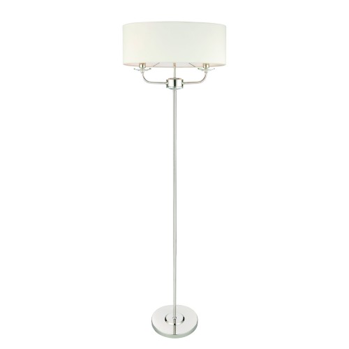 Lampa podłogowa Nixon o wysokości 157 cm, wykonana z niklu, z prostą podstawą i okrągłym kloszem w kolorze białym. Ujęcie frontalne, produkt stoi na białym tle, eksponując metalowe wykończenia i minimalistyczny design.