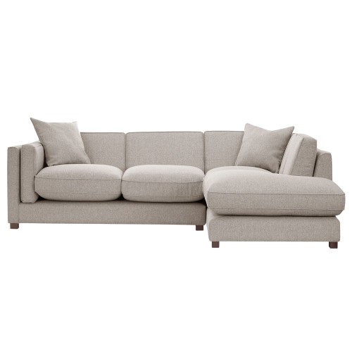 Elegancki narożnik Empirio w odcieniu jasnoszarym, z poduszkami na siedzisku i oparciu. Produkt rozłożony w formie litery L, widoczny z boku. Wymiary: 270x190 cm. Prosta, teksturowana tkanina w subtelnym kolorze na stelażu z niskimi nóżkami.