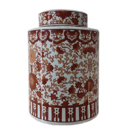 Ceramiczna waza amfora w kolorze białym z brązowym wzorem kwiatowym. Wysoka, cylindryczna forma, zbliżenie na detale zdobień na powierzchni. Produkt stoi na prostym tle, ukazuje dekoracyjne motywy i kształt. Wysokość 27,5 cm.