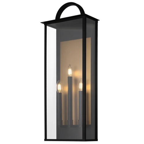 Czarny, prostokątny kinkiet zewnętrzny Luce (29x14x76 cm) z trzema świeczkami, metalową ramą i przezroczystym szkłem, montowany na ścianie. Nowoczesny i elegancki design na prostym tle.