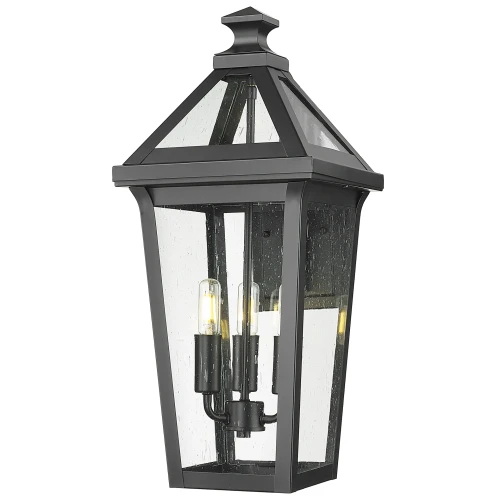 Czarny kinkiet zewnętrzny Fiorente o wymiarach 27,5x24x54 cm, prostokątny, z metalowym stelażem i szklanymi ściankami, z instalacją na trzy źródła światła, przedstawiony frontalnie.