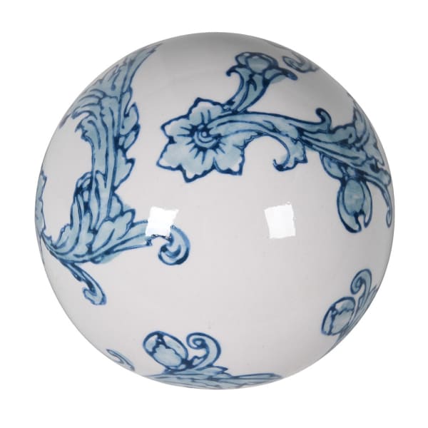 Porcelanowa kula dekoracyjna w kolorze białym z niebieskim zdobieniem w stylu Delft. Okrągły kształt, błyszcząca powierzchnia, na której widoczne są kwiatowe motywy i delikatne liście. Produkt wyróżnia klasyczna estetyka.