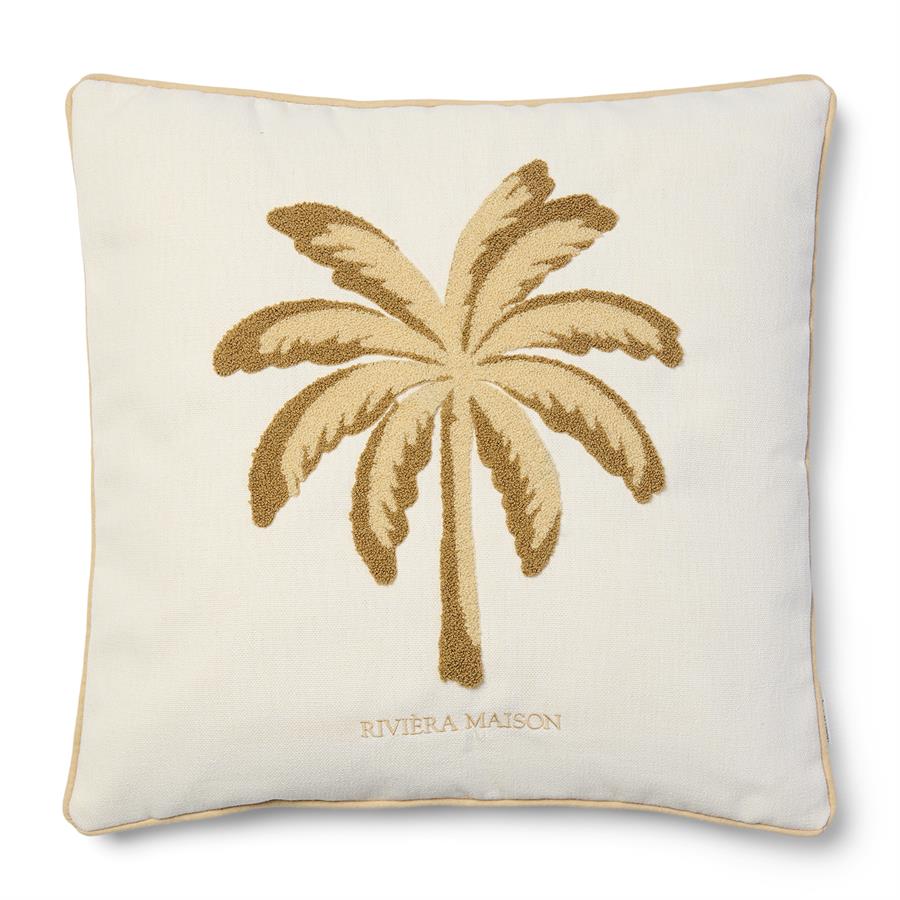 Poduszka dekoracyjna w kolorze białym o wymiarach 50x50 cm z haftem przedstawiającym palmę w odcieniach brązu. Produkt posiada delikatne wykończenie w kolorze beżowym oraz logo RIVIERA MAISON na dolnej krawędzi.