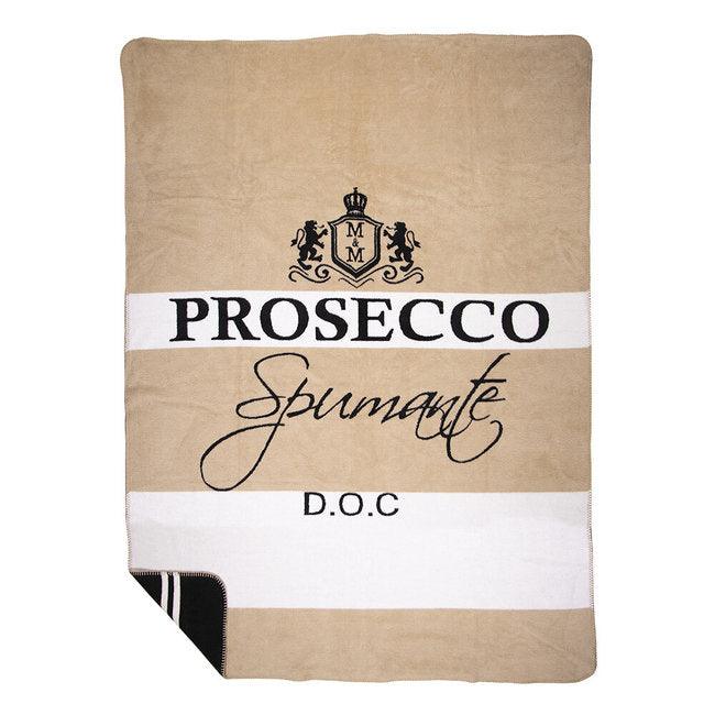 Dwustronny koc Prosecco o wymiarach 150x200 cm, w kolorze beżowym z czarnymi i białymi pasami. Na kocu widoczny napis PROSECCO Spumante D.O.C. oraz dekoracyjne logo. Produkt leży na jednolitym tle, ukazując jego detale.